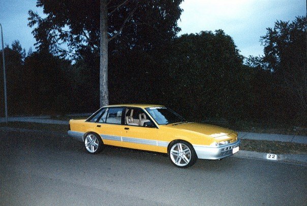 Old photo of a yellow Holden VL Calais Turbo BT1