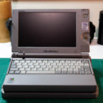 The Toshiba Libretto 100CT, sitting on its dock with its lid open.